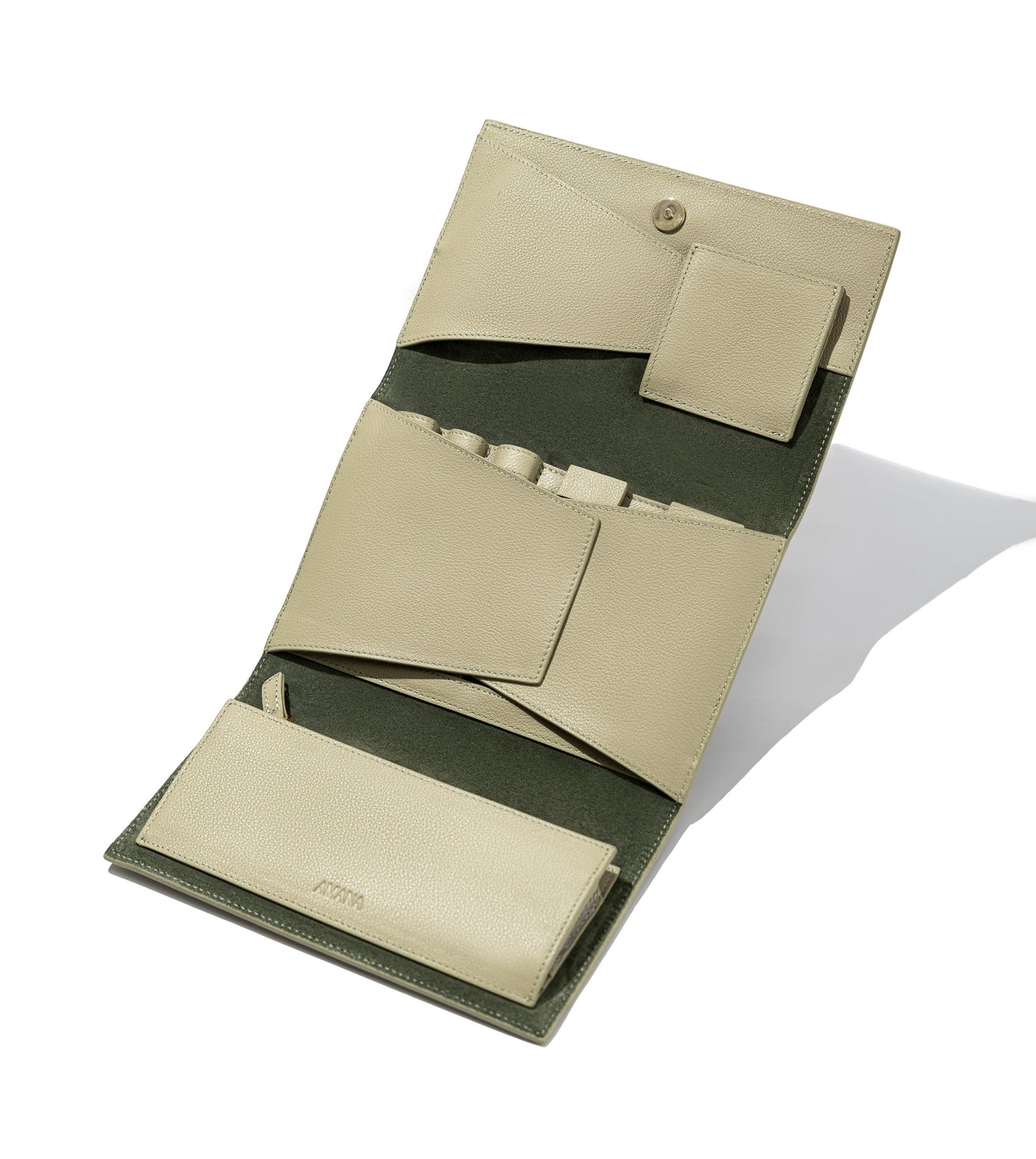 Olive jewelry wallet opened but flaps closed