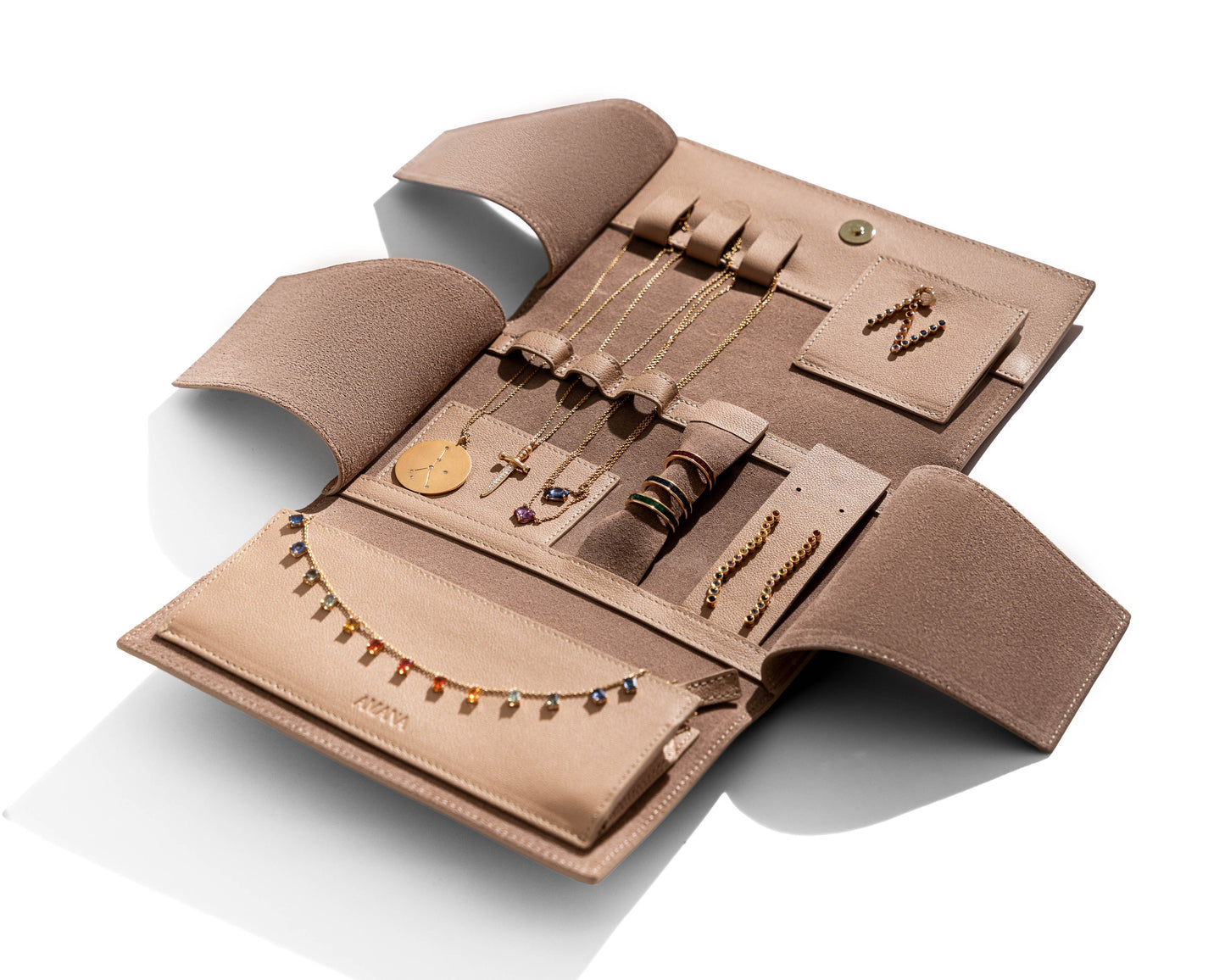 Amber jewelry wallet with rings and necklaces securely stored inside
