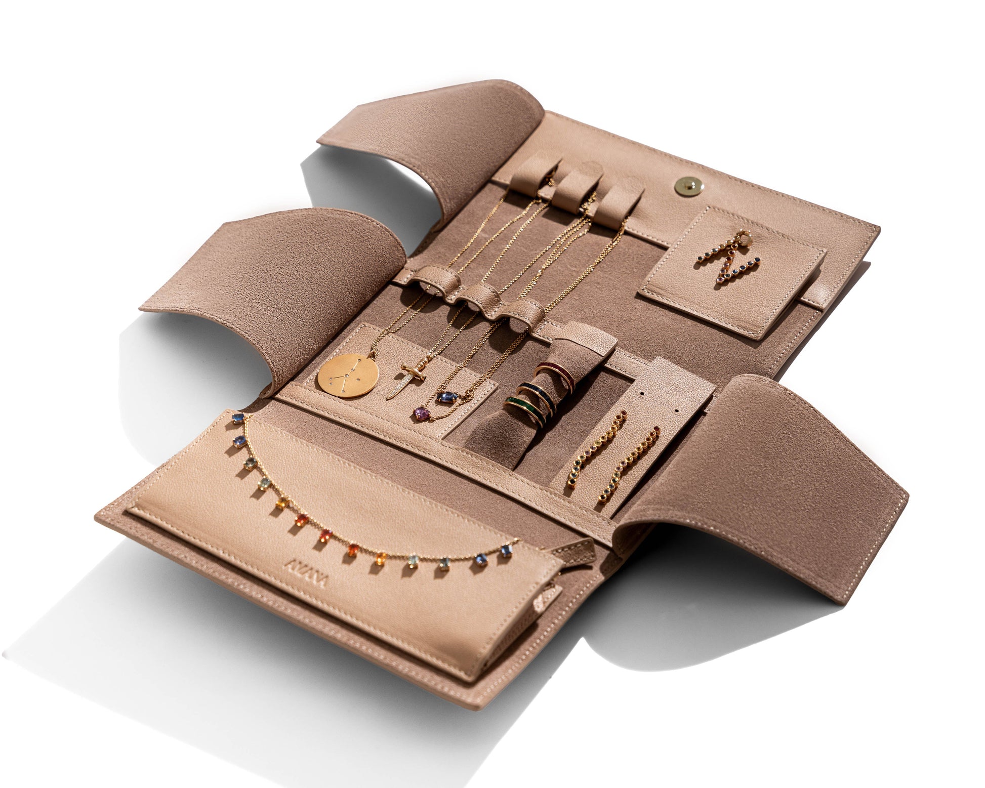 Amber jewelry wallet with rings and necklaces securely stored inside